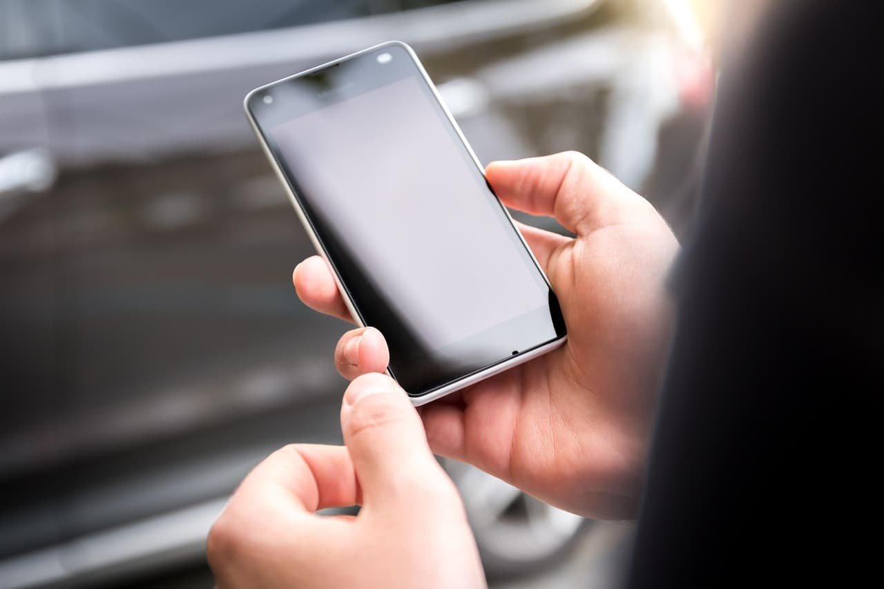 a people with a smartphone
